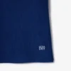 Polo de tennis à col rayé avec protection UV pour femme Polo de tennis à col rayé avec protection UV pour femme