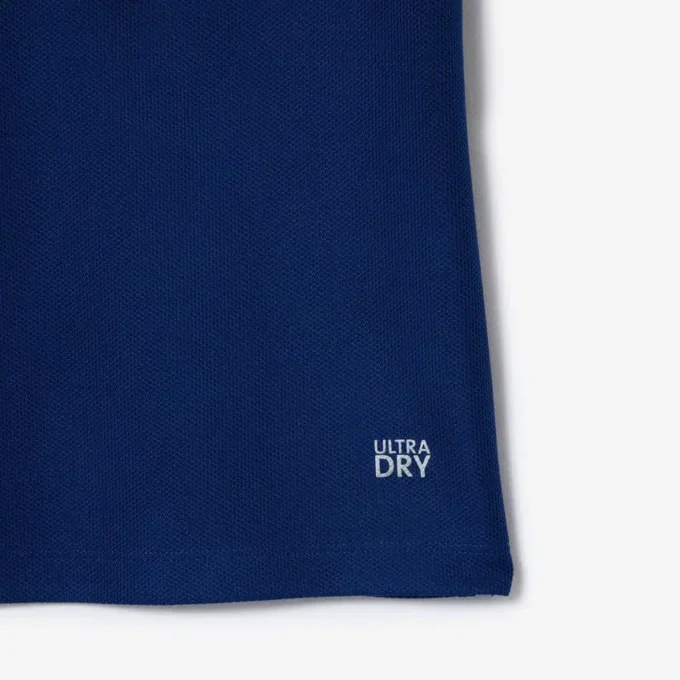 Polo de tennis à col rayé avec protection UV pour femme Polo de tennis à col rayé avec protection UV pour femme