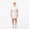Polo de tennis à col rayé avec protection UV pour femme Polo de tennis à col rayé avec protection UV pour femme