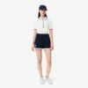 Polo de tennis thermorégulateur pour femme, coupe classique Polo de tennis thermorégulateur pour femme, coupe classique