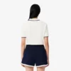 Polo de tennis thermorégulateur pour femme, coupe classique Polo de tennis thermorégulateur pour femme, coupe classique