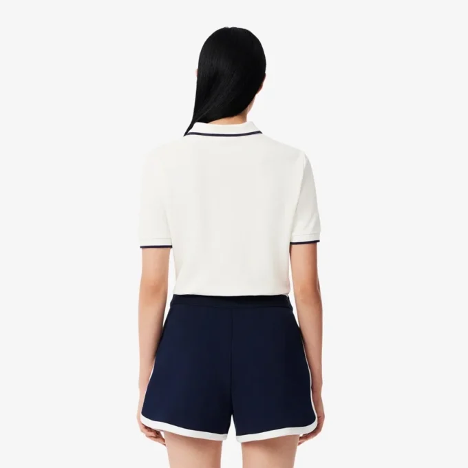 Polo de tennis thermorégulateur pour femme, coupe classique Polo de tennis thermorégulateur pour femme, coupe classique