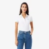 Polo femme L.12.D coupe ajustée avec bordures Polo femme L.12.D coupe ajustée avec bordures