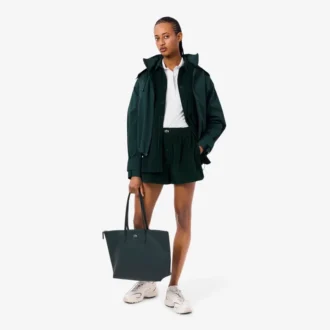 Polo femme L.12.D coupe ajustée avec bordures