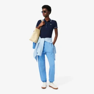 Polo femme L.12.D coupe ajustée avec bordures