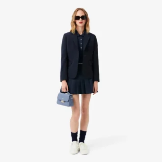 Polo femme L.12.D coupe ajustée avec bordures