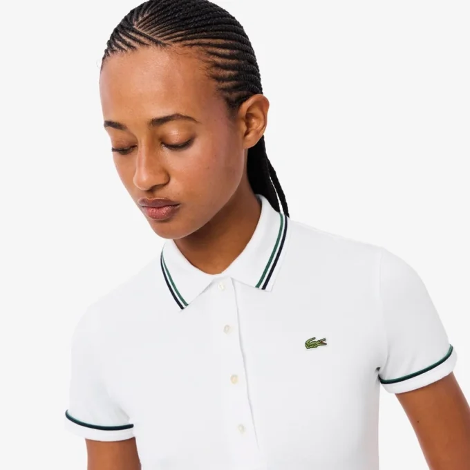 Polo femme L.12.D coupe ajustée avec bordures Polo femme L.12.D coupe ajustée avec bordures