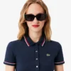 Polo femme L.12.D coupe ajustée avec bordures Polo femme L.12.D coupe ajustée avec bordures