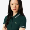 Polo femme L.12.D coupe ajustée avec bordures Polo femme L.12.D coupe ajustée avec bordures