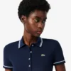 Polo femme L.12.D coupe ajustée avec bordures Polo femme L.12.D coupe ajustée avec bordures