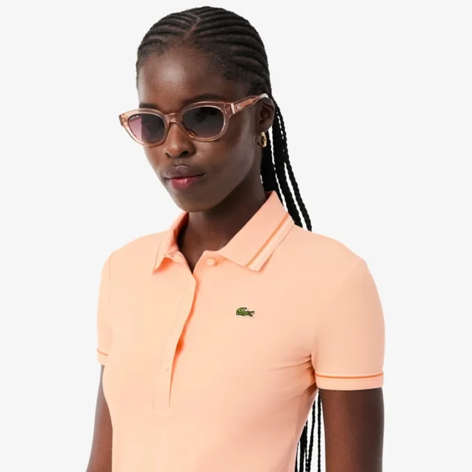 Polo femme L.12.D coupe ajustée avec bordures Polo femme L.12.D coupe ajustée avec bordures