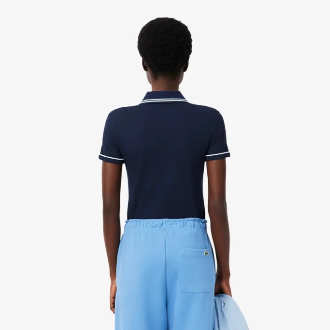 Polo femme L.12.D coupe ajustée avec bordures Polo femme L.12.D coupe ajustée avec bordures