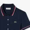 Polo femme L.12.D coupe ajustée avec bordures Polo femme L.12.D coupe ajustée avec bordures