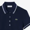 Polo femme L.12.D coupe ajustée avec bordures Polo femme L.12.D coupe ajustée avec bordures