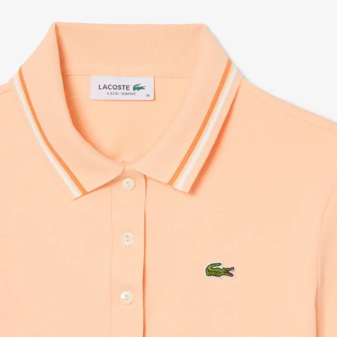 Polo femme L.12.D coupe ajustée avec bordures Polo femme L.12.D coupe ajustée avec bordures