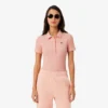 Polo femme slim fit L.12.D en coton côtelé Polo femme slim fit L.12.D en coton côtelé
