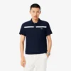 Polo Heritage de tennis pour homme avec badge Ultra Dry Polo Heritage de tennis pour homme avec badge Ultra Dry