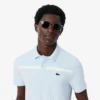 Polo Heritage de tennis pour homme avec badge Ultra Dry Polo Heritage de tennis pour homme avec badge Ultra Dry
