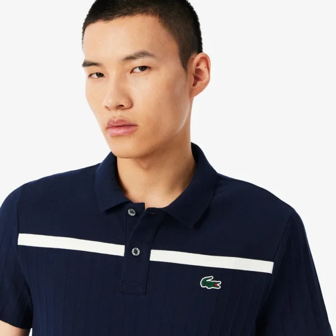 Polo Heritage de tennis pour homme avec badge Ultra Dry Polo Heritage de tennis pour homme avec badge Ultra Dry
