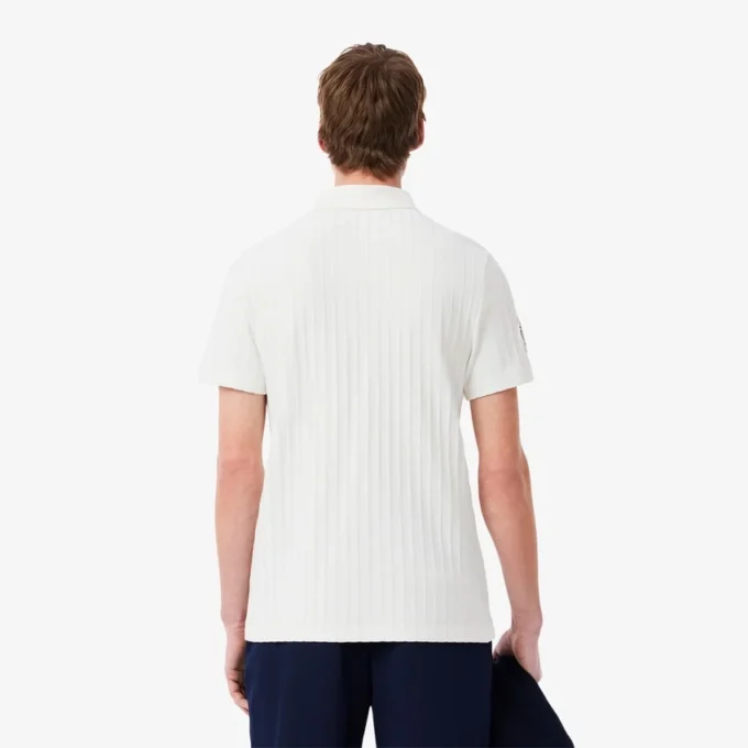 Polo Heritage de tennis pour homme avec badge Ultra Dry Polo Heritage de tennis pour homme avec badge Ultra Dry