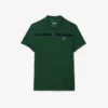 Polo Heritage de tennis pour homme avec badge Ultra Dry Polo Heritage de tennis pour homme avec badge Ultra Dry