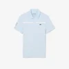 Polo Heritage de tennis pour homme avec badge Ultra Dry Polo Heritage de tennis pour homme avec badge Ultra Dry
