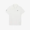 Polo Heritage de tennis pour homme avec badge Ultra Dry Polo Heritage de tennis pour homme avec badge Ultra Dry