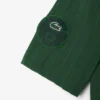 Polo Heritage de tennis pour homme avec badge Ultra Dry Polo Heritage de tennis pour homme avec badge Ultra Dry