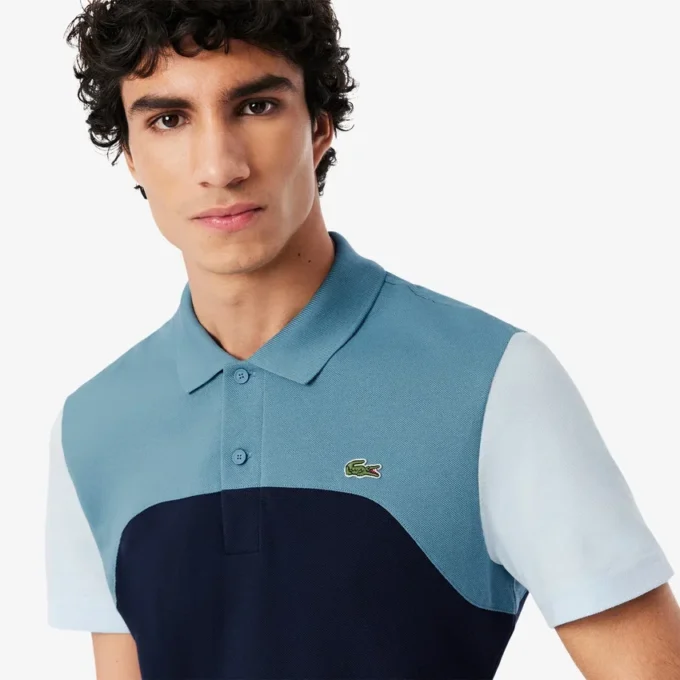 Polo L.12.12 à empiècements colorés pour homme, coupe classique Polo L.12.12 à empiècements colorés pour homme, coupe classique