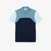 Polo L.12.12 à empiècements colorés pour homme, coupe classique Polo L.12.12 à empiècements colorés pour homme, coupe classique