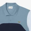 Polo L.12.12 à empiècements colorés pour homme, coupe classique Polo L.12.12 à empiècements colorés pour homme, coupe classique