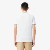 Polo L.12.12 pour homme, coupe classique avec bordures contrastées Polo L.12.12 pour homme, coupe classique avec bordures contrastées