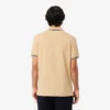 Polo L.12.12 pour homme, coupe classique avec bordures contrastées Polo L.12.12 pour homme, coupe classique avec bordures contrastées