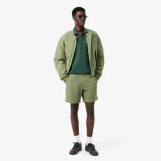 Polo L.12.12 pour homme, coupe classique avec poche
