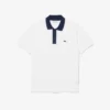 Polo L.12.12 pour homme, coupe classique et col contrasté Polo L.12.12 pour homme, coupe classique et col contrasté