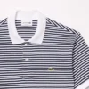 Polo L.12.12 rayé en petit piqué, coupe classique pour homme Polo L.12.12 rayé en petit piqué, coupe classique pour homme