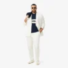 Polo L.12.12 à rayures larges et coupe classique pour homme Polo L.12.12 à rayures larges et coupe classique pour homme