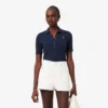 Polo L.12.D pour femme, coupe ajustée, motif Pointelle Polo L.12.D pour femme, coupe ajustée, motif Pointelle