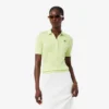 Polo L.12.D pour femme, coupe ajustée, motif Pointelle Polo L.12.D pour femme, coupe ajustée, motif Pointelle