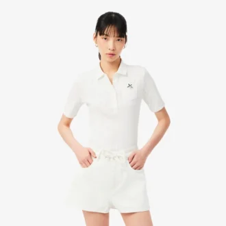 Polo L.12.D pour femme, coupe ajustée, motif Pointelle