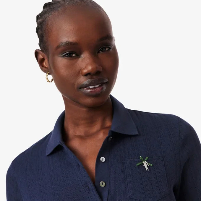 Polo L.12.D pour femme, coupe ajustée, motif Pointelle Polo L.12.D pour femme, coupe ajustée, motif Pointelle