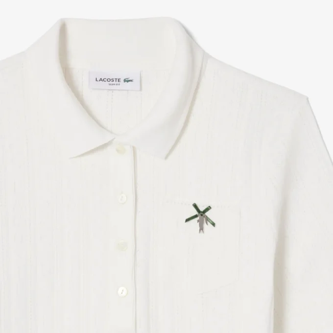 Polo L.12.D pour femme, coupe ajustée, motif Pointelle Polo L.12.D pour femme, coupe ajustée, motif Pointelle