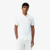 Polo Lacoste Tennis X Novak Djokovic sur le court Polo Lacoste Tennis X Novak Djokovic sur le court