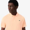 Polo Lacoste Tennis X Novak Djokovic sur le court Polo Lacoste Tennis X Novak Djokovic sur le court