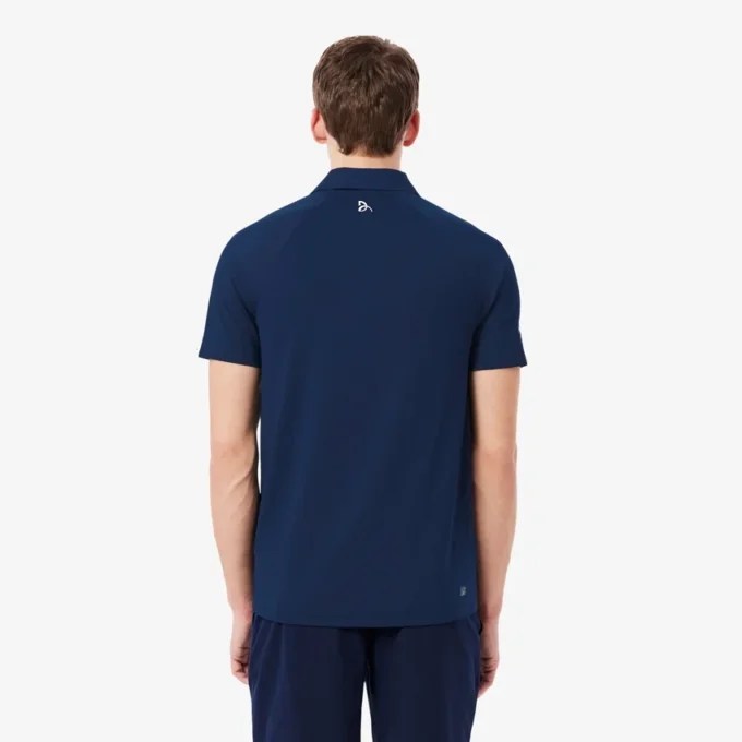 Polo Lacoste Tennis X Novak Djokovic sur le court Polo Lacoste Tennis X Novak Djokovic sur le court