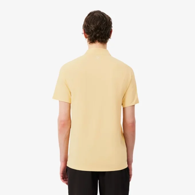Polo Lacoste Tennis X Novak Djokovic sur le court Polo Lacoste Tennis X Novak Djokovic sur le court