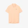 Polo Lacoste Tennis X Novak Djokovic sur le court Polo Lacoste Tennis X Novak Djokovic sur le court