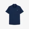 Polo Lacoste Tennis X Novak Djokovic sur le court Polo Lacoste Tennis X Novak Djokovic sur le court
