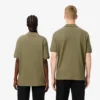 Polo unisexe ample L.12.12 avec écusson Piqua