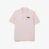 Polo unisexe L.12.12 en piqué, coupe ample Polo unisexe L.12.12 en piqué, coupe ample